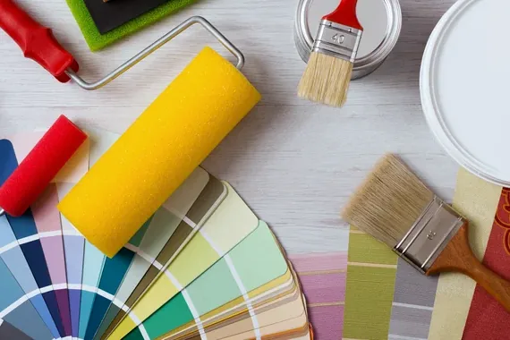 Coastal color palette swatches with brushes and rollers